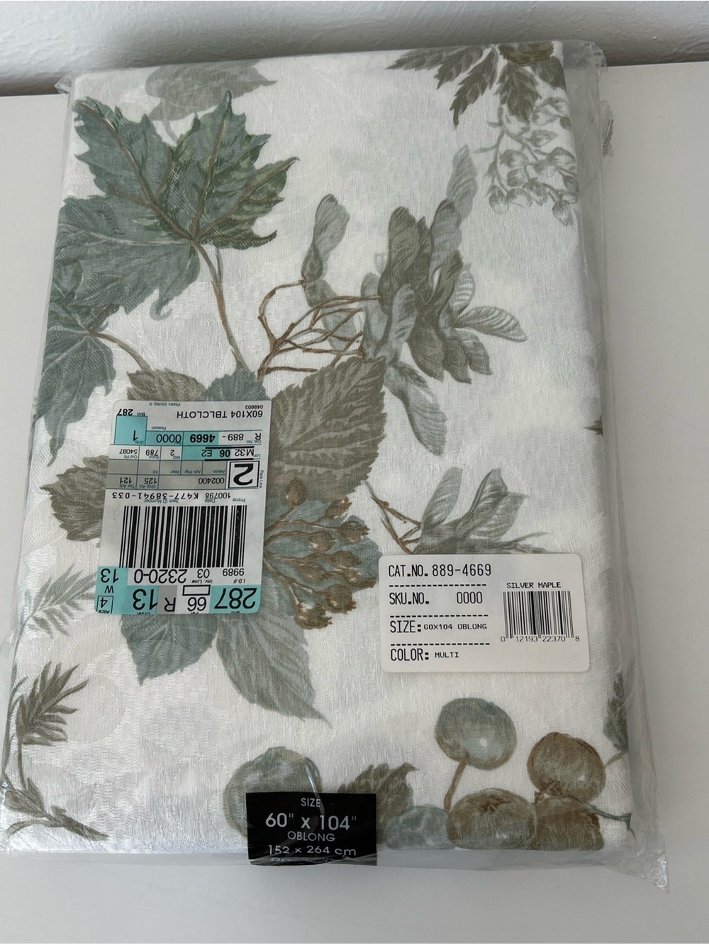 NEW- Fashion Industries Silver Maple 60x104” Oblong Tablecloth,  White w Leaves